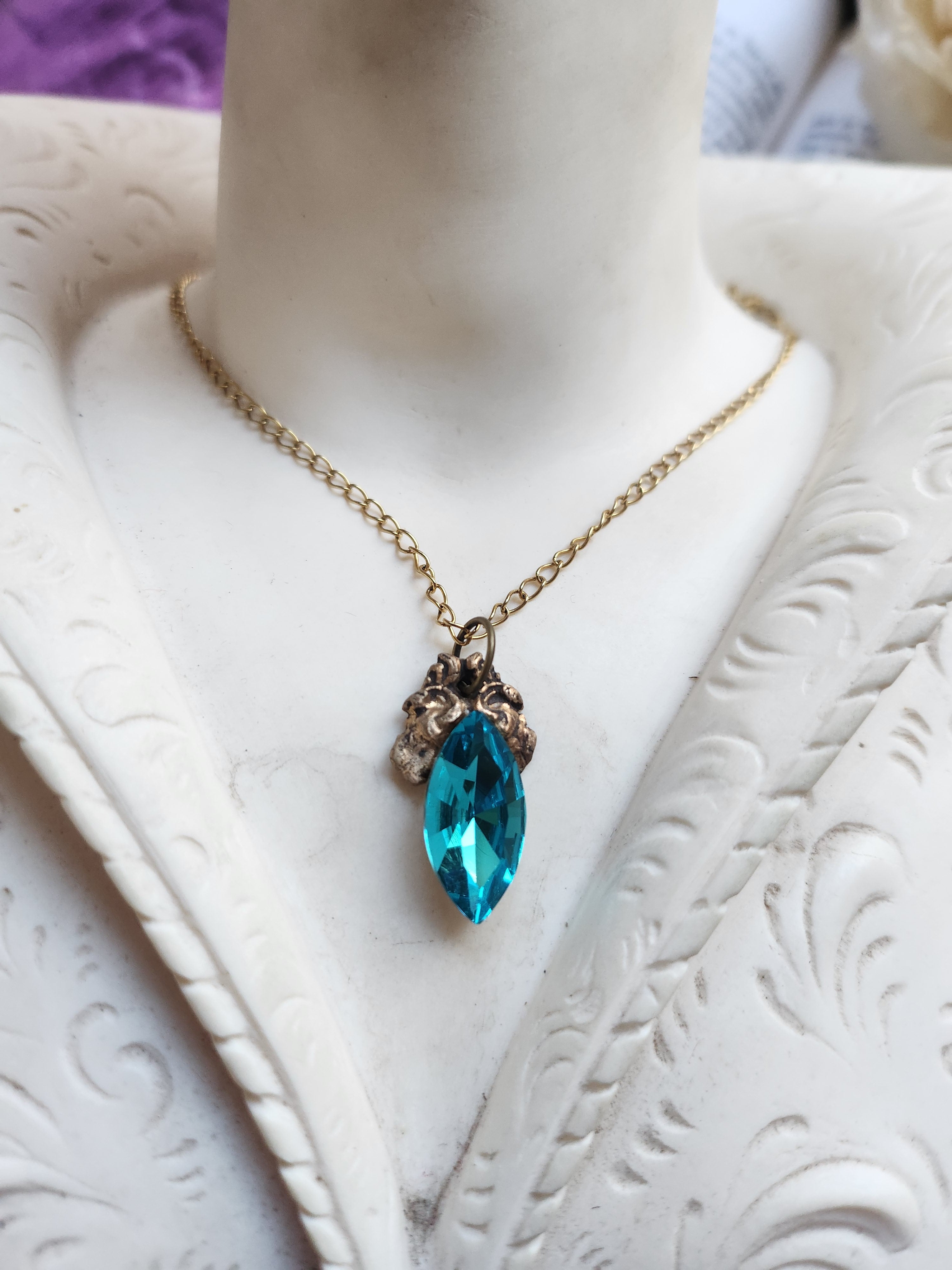 Arcane Resonance Collection – Handmade Bronze Pendant with Electric Blue Navette Crystal