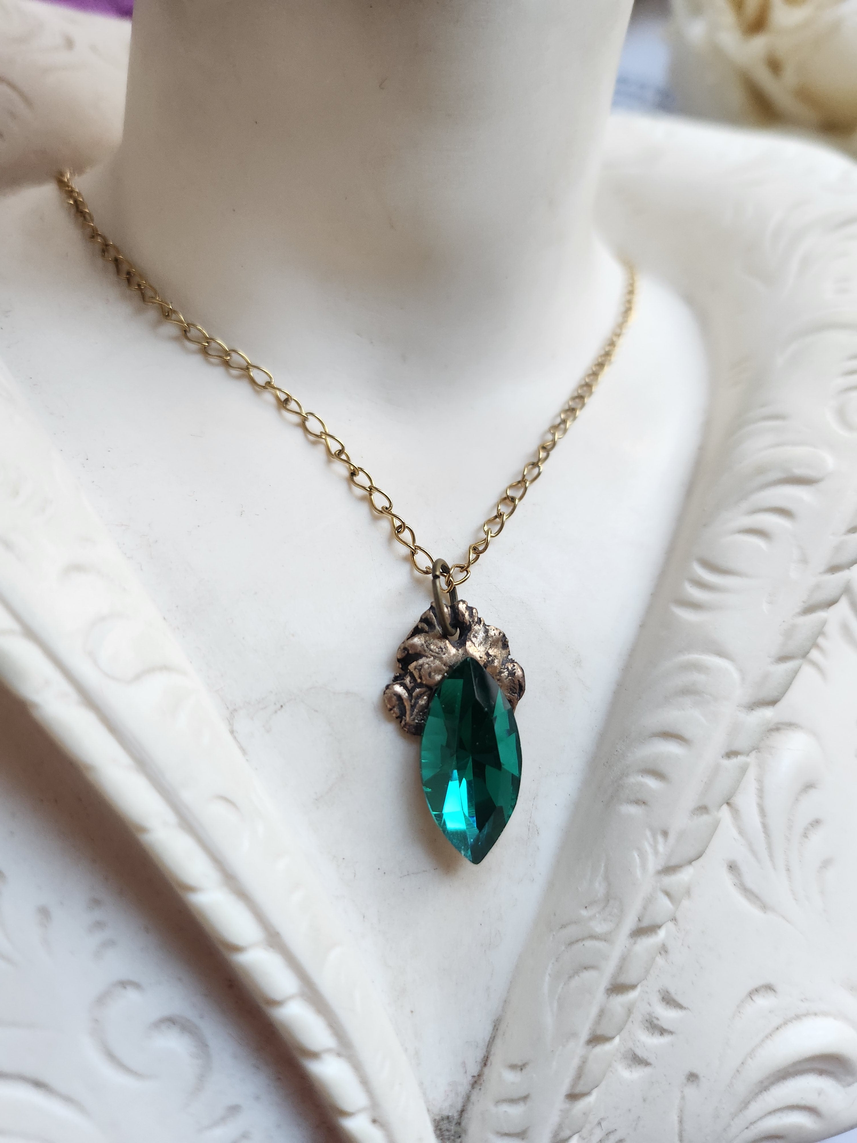 Arcane Resonance Collection – Handmade Bronze Pendant with Emerald Green Navette Crystal