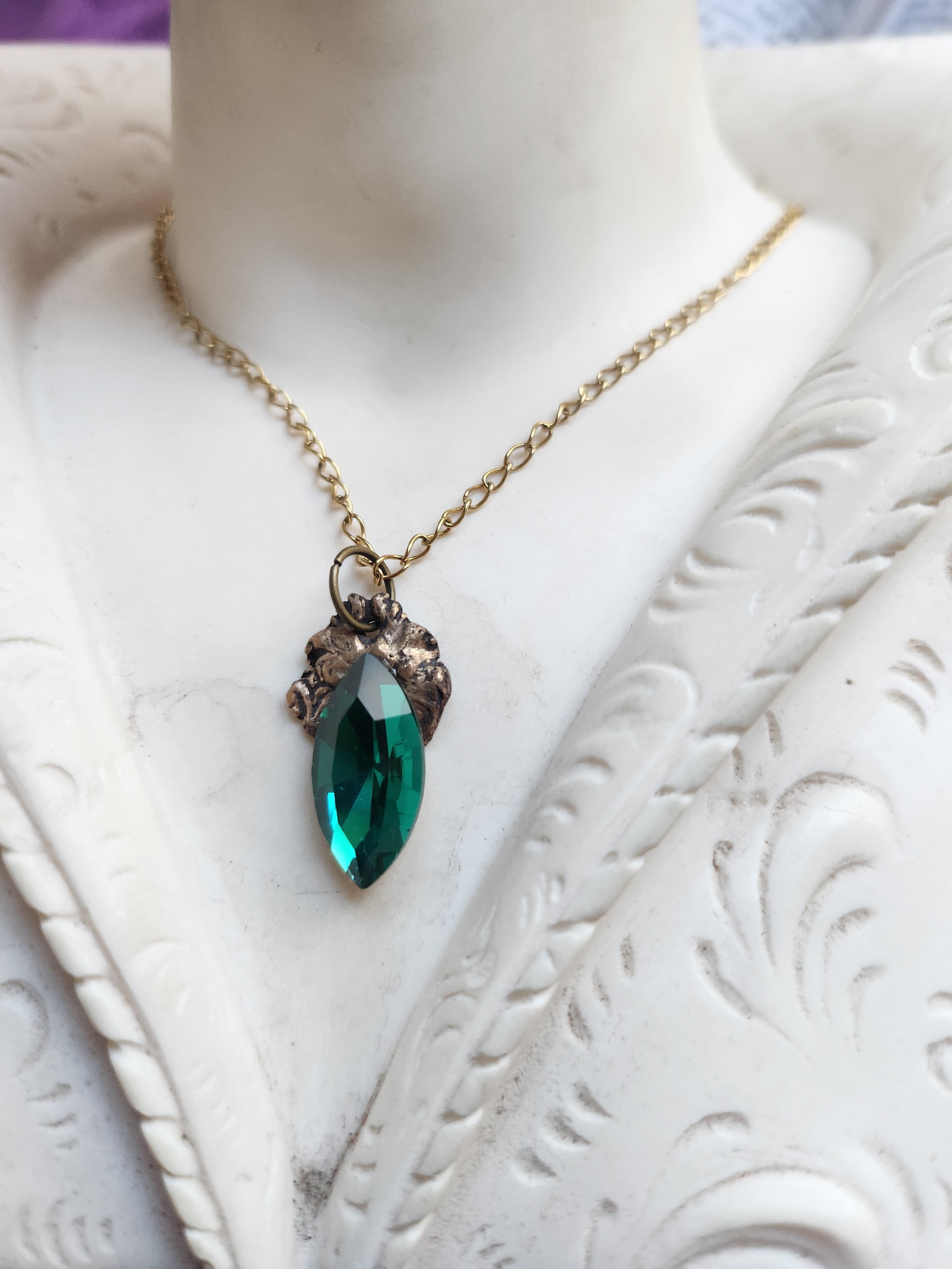 Arcane Resonance Collection – Handmade Bronze Pendant with Emerald Green Navette Crystal