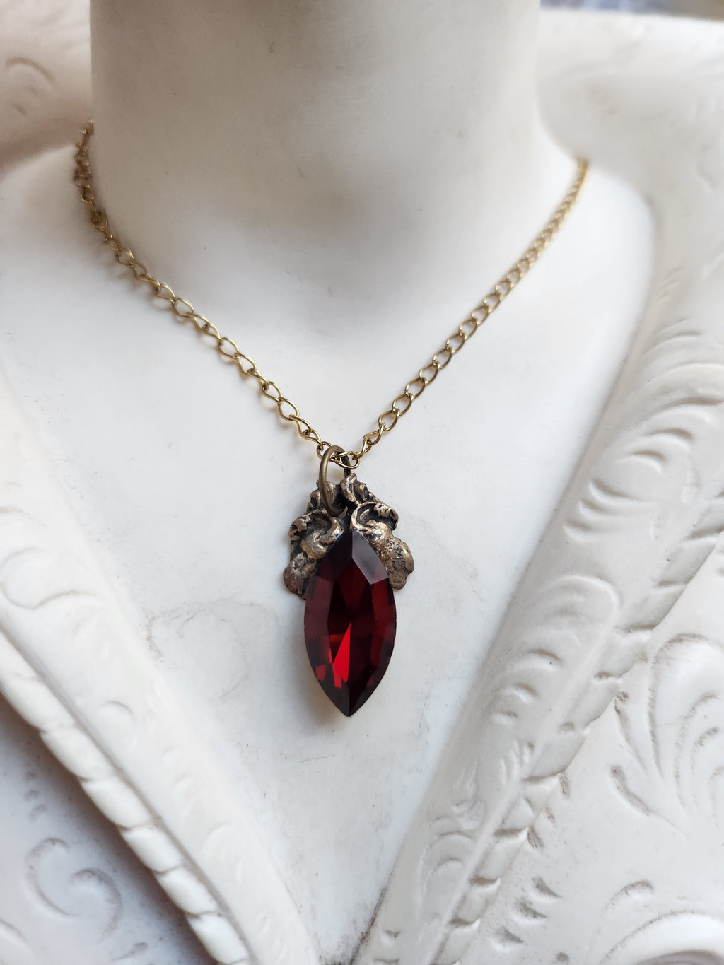 Arcane Resonance Collection – Handmade Bronze Pendant with Deep Red Navette Crystal