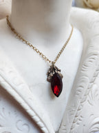 Arcane Resonance Collection – Handmade Bronze Pendant with Deep Red Navette Crystal