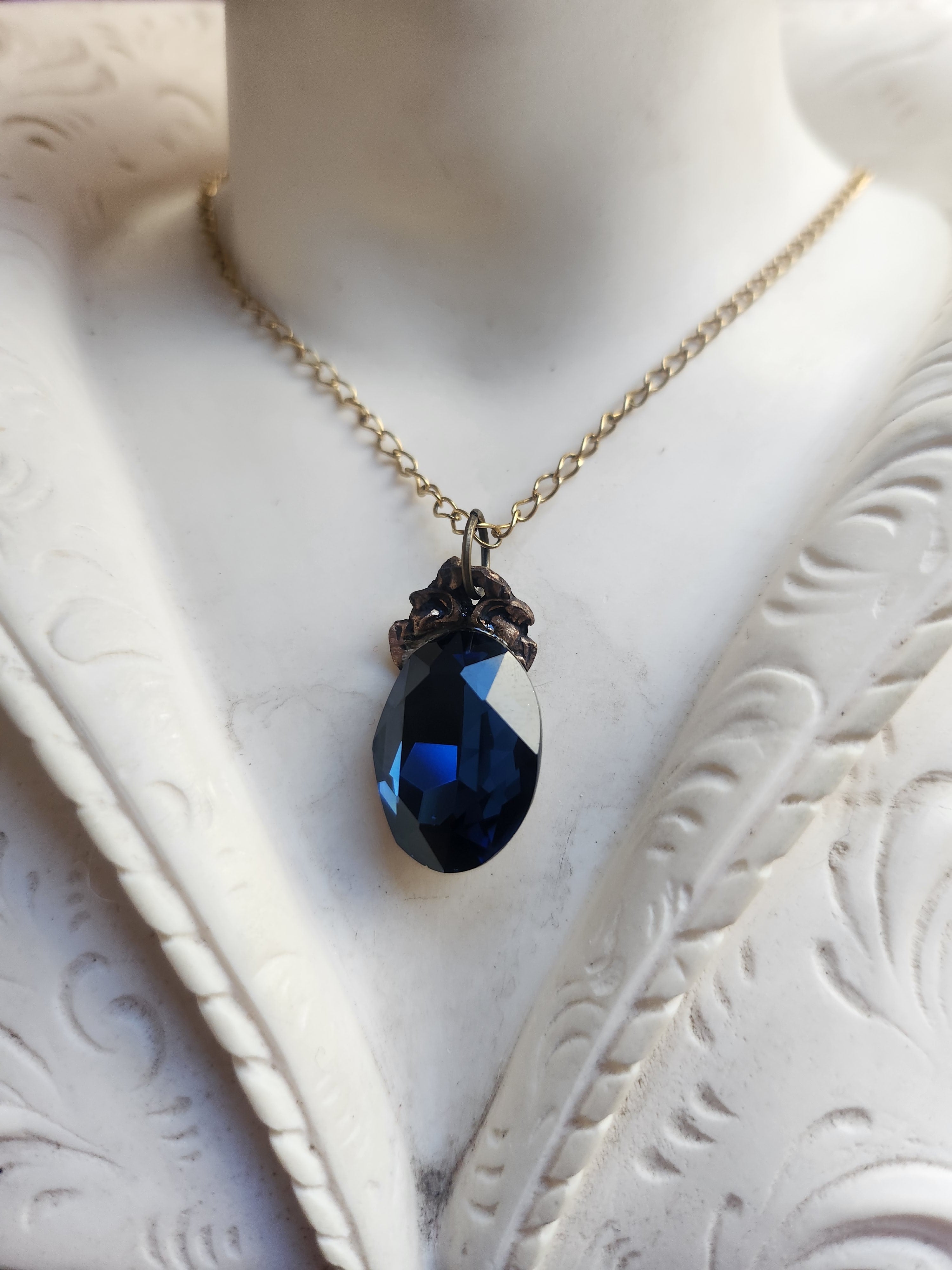 Arcane Resonance Collection – Small Handmade Bronze Pendant with Deep Blue Oval Crystal