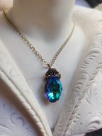Arcane Resonance Collection – Small Handmade Bronze Pendant with Blue and Green Oval Crystal