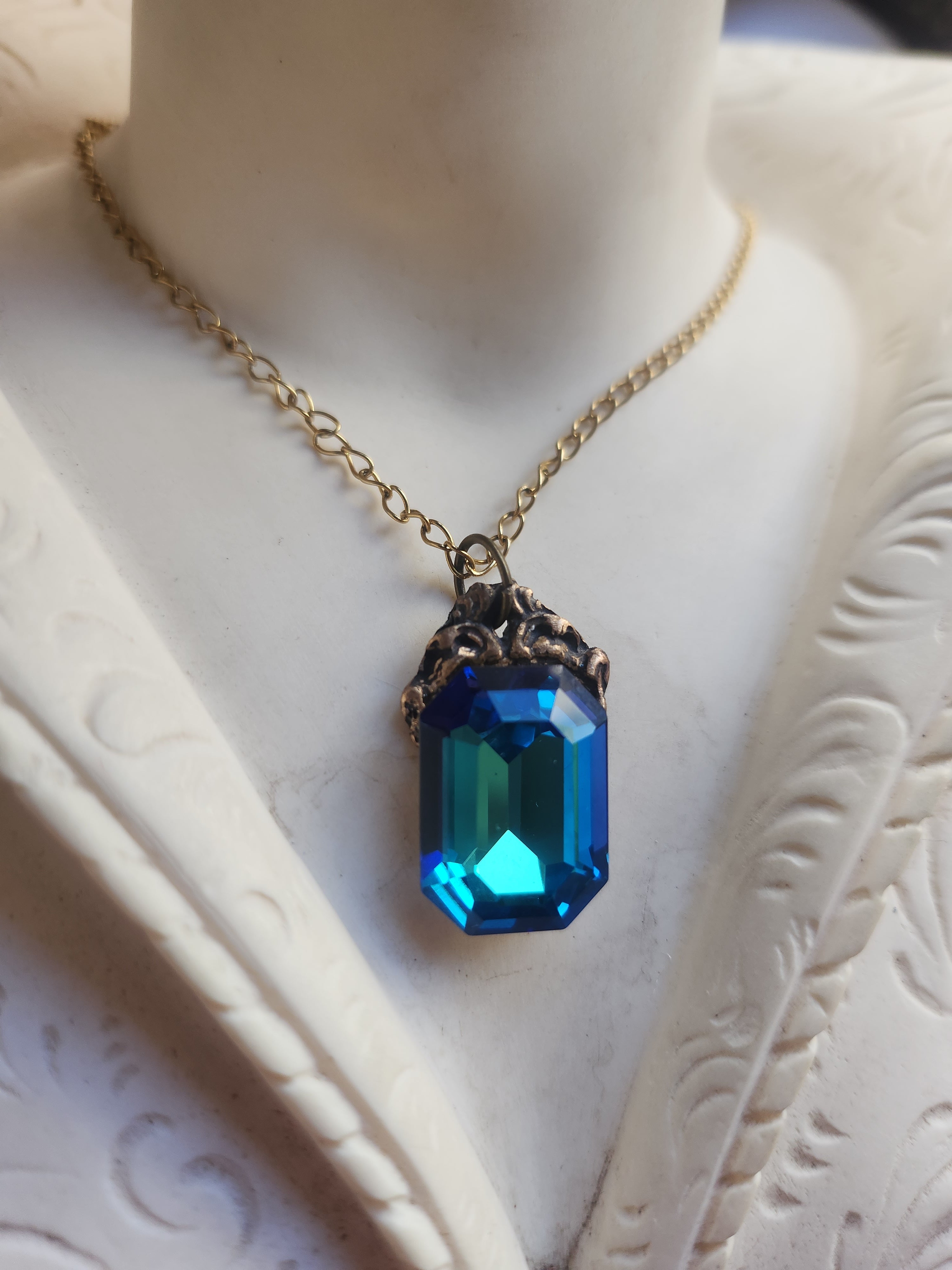 Arcane Resonance Collection – Handmade Bronze Pendant with Blue and Green Octagon Crystal
