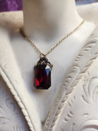 Arcane Resonance Collection – Handmade Bronze Pendant with Deep Red Octagon Crystal