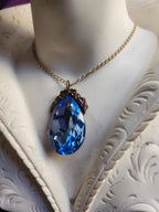 Mystic Baroque Collection – Handmade Bronze Pendant with Light Blue Teardrop Crystal