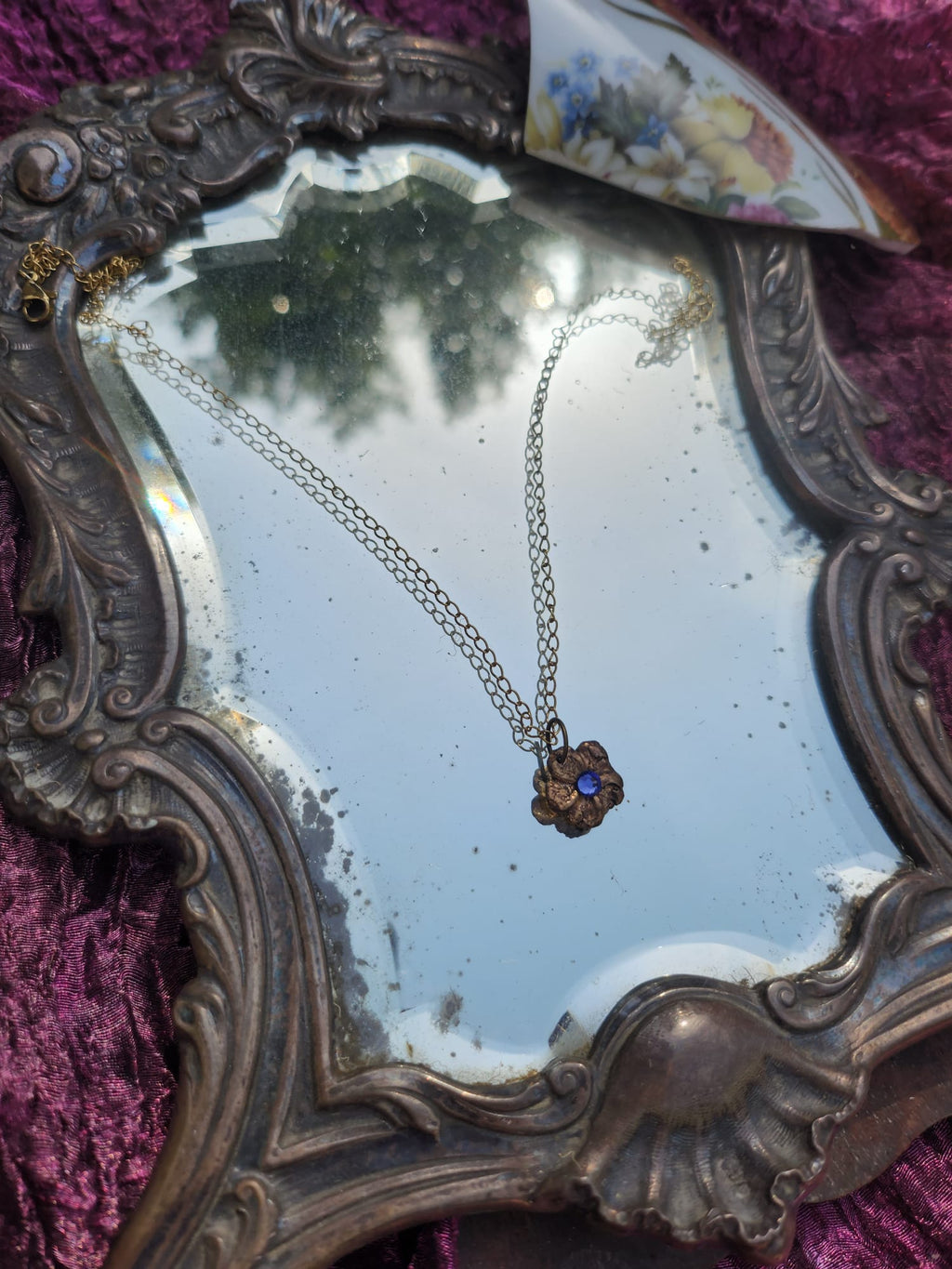 Eternal Bloom Collection – Handmade Bronze Flower Pendant with Tanzanite Crystal