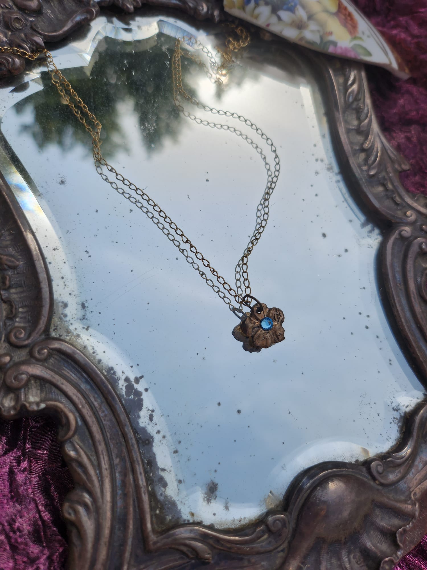 Eternal Bloom Collection – Handmade Bronze Flower Pendant with Light Blue Crystal