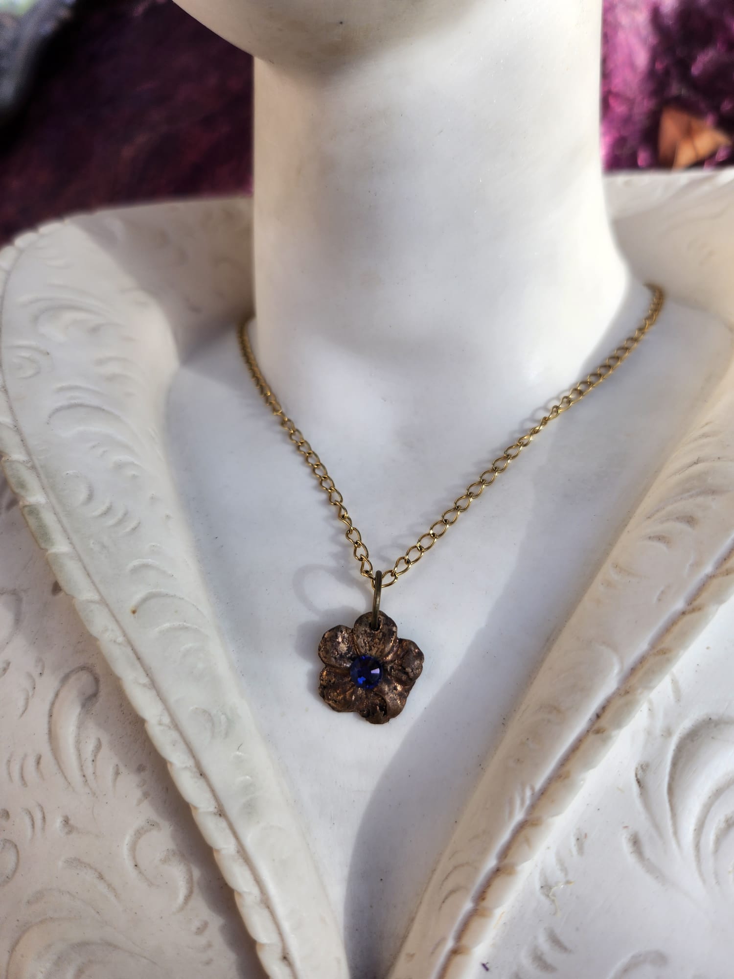 Eternal Bloom Collection – Handmade Bronze Flower Pendant with Tanzanite Crystal