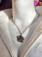 Eternal Bloom Collection – Handmade Bronze Flower Pendant with Light Blue Crystal
