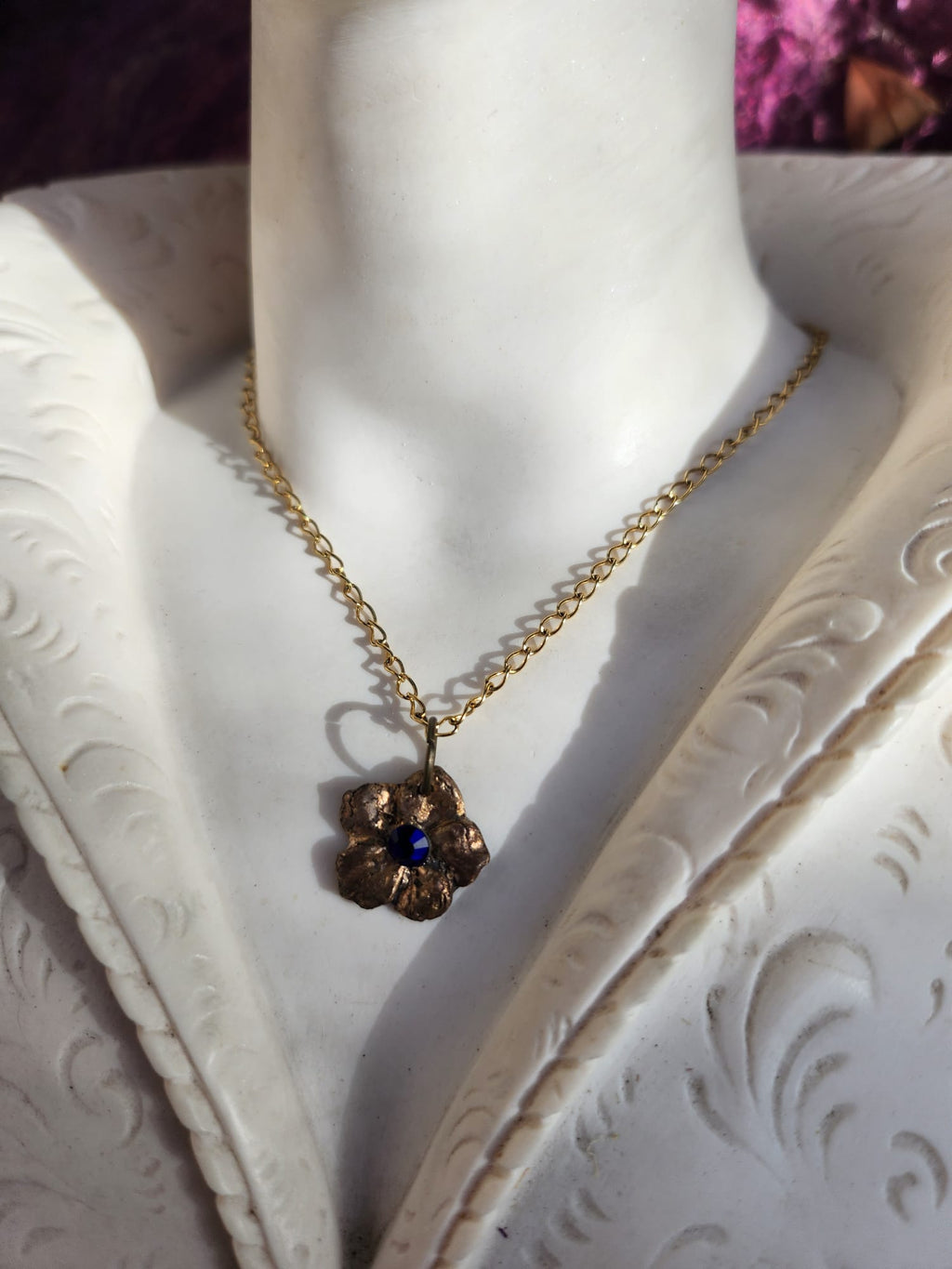 Eternal Bloom Collection – Handmade Bronze Flower Pendant with Royal Blue Crystal