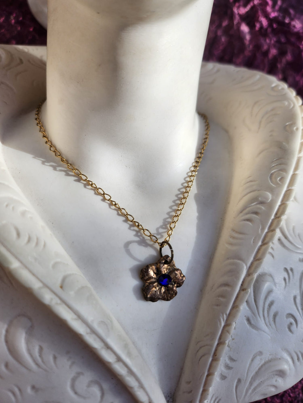 Eternal Bloom Collection – Handmade Bronze Flower Pendant with Royal Blue Crystal