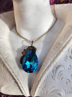 Mystic Baroque Collection – Handmade Bronze Pendant with Blue Teardrop Crystal