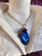 Mystic Baroque Collection – Handmade Bronze Pendant with Midnight Blue Crystal Marquise-Cut