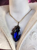 Mystic Baroque Collection – Handmade Bronze Pendant with Deep Blue Crystal Marquise-Cut