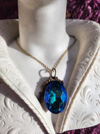 Mystic Baroque Collection – Handmade Bronze Pendant with Electric Blue Oval Crystal