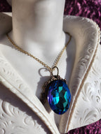 Mystic Baroque Collection – Handmade Bronze Pendant with Electric Blue Oval Crystal