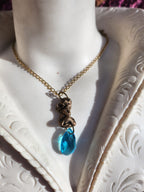 Echoes of Heaven Collection - Handmade Bronze Angel Pendant with Sky Blue Crystal