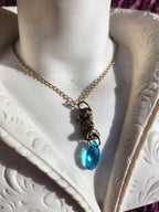 Echoes of Heaven Collection - Handmade Bronze Angel Pendant with Sky Blue Crystal