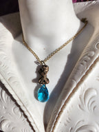 Echoes of Heaven Collection - Handmade Bronze Angel Pendant with Sky Blue Crystal