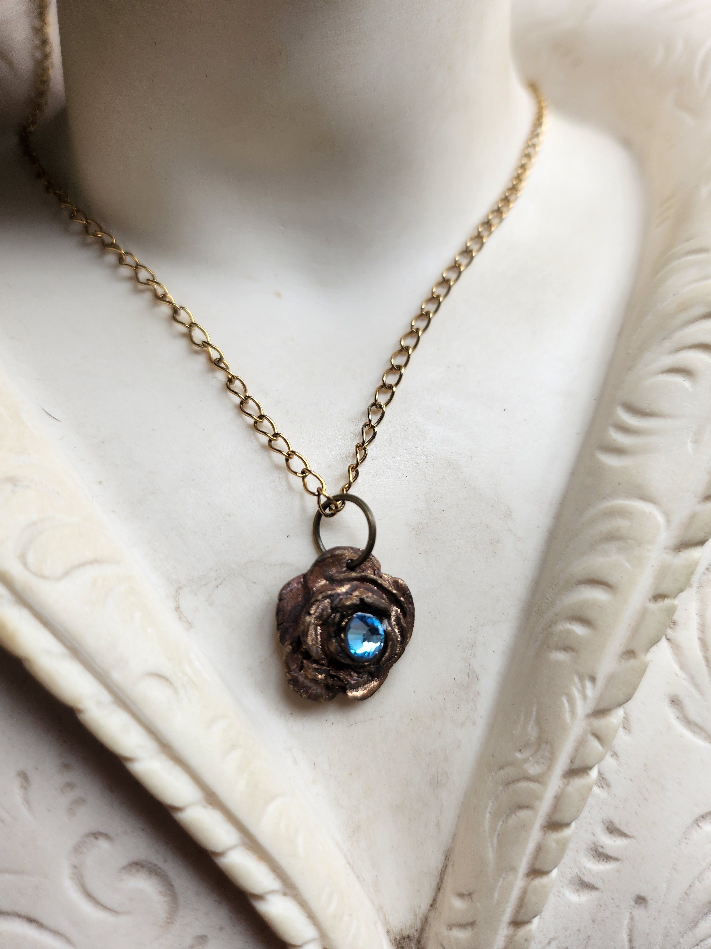 Rosarium Collection - Handmade Bronze Rose Pendant with Light Blue Crystal