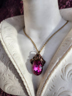 Arcane Resonance Collection – Handmade Bronze Pendant with Fuchsia Oval Crystal