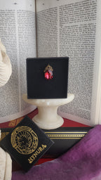 Arcane Resonance Collection – Small Handmade Bronze Pendant with Light Red Oval Crystal