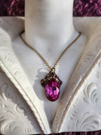 Arcane Resonance Collection – Handmade Bronze Pendant with Fuchsia Oval Crystal