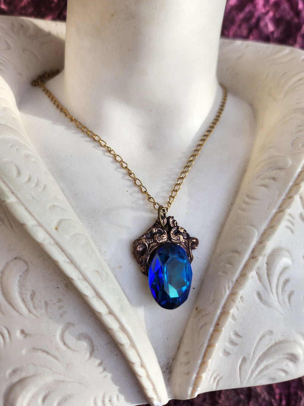 Arcane Resonance Collection – Handmade Bronze Pendant with Blue Oval Crystal
