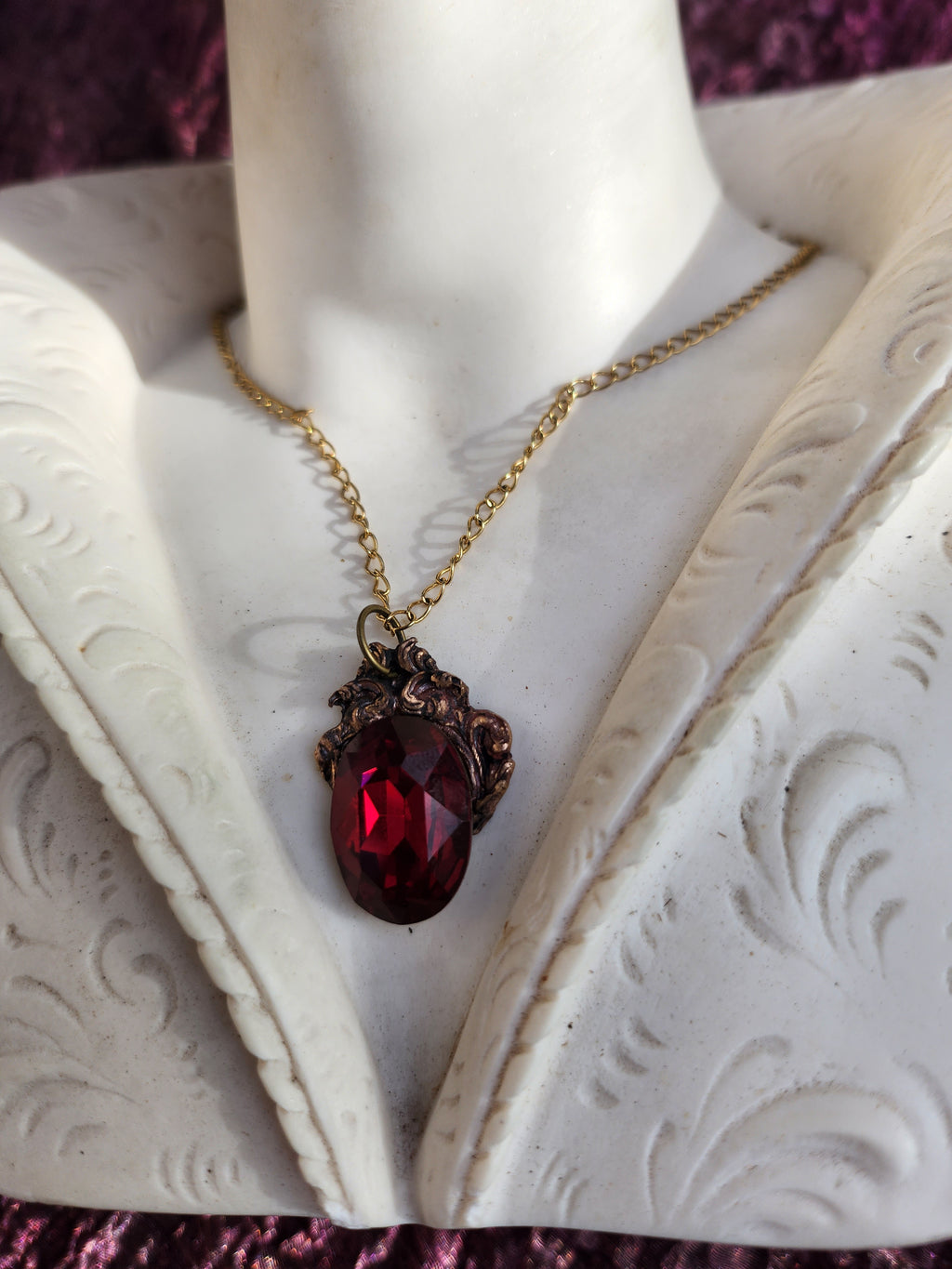Arcane Resonance Collection – Handmade Bronze Pendant with Ruby Red Oval Crystal