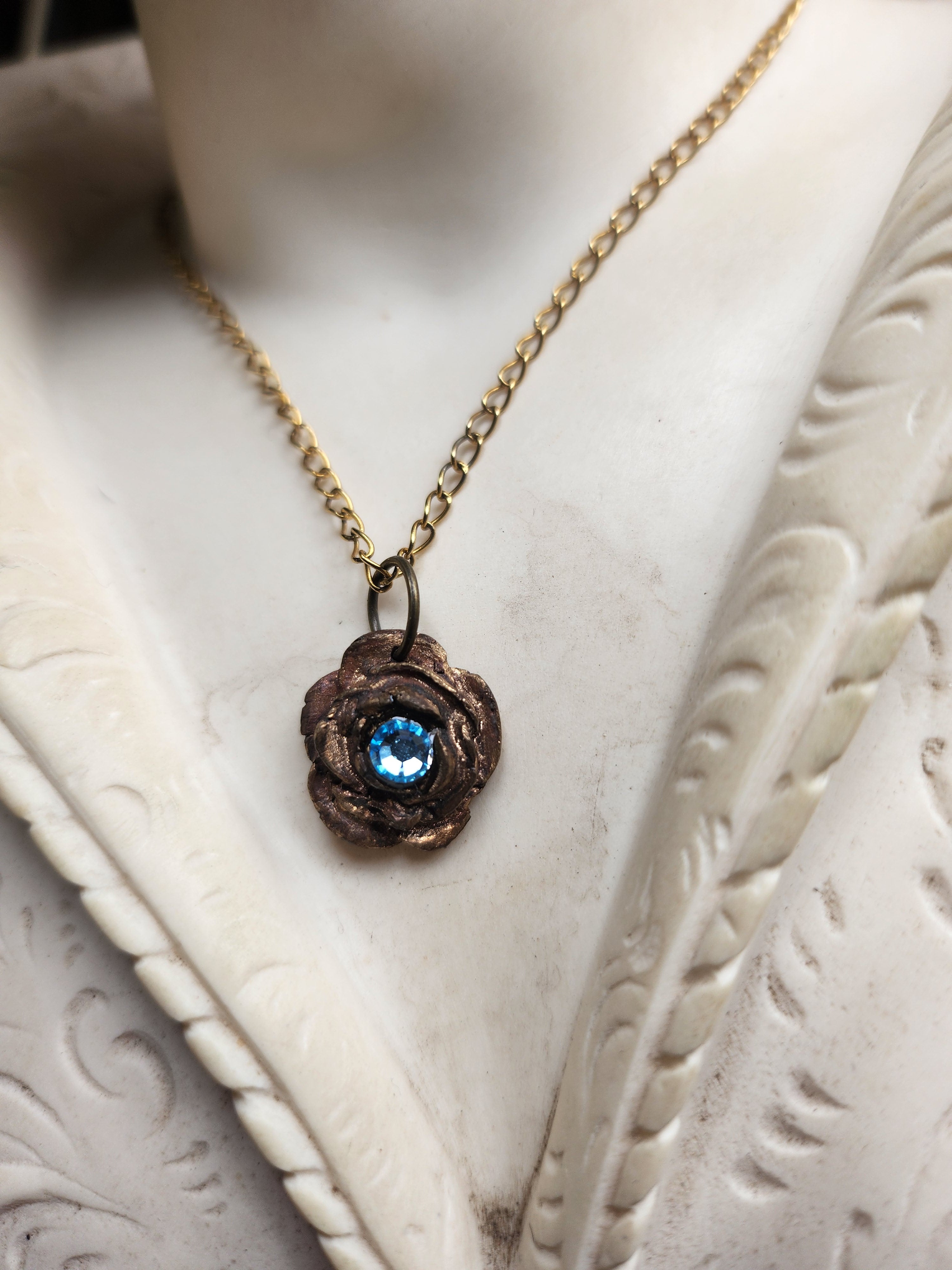 Rosarium Collection - Handmade Bronze Rose Pendant with Light Blue Crystal