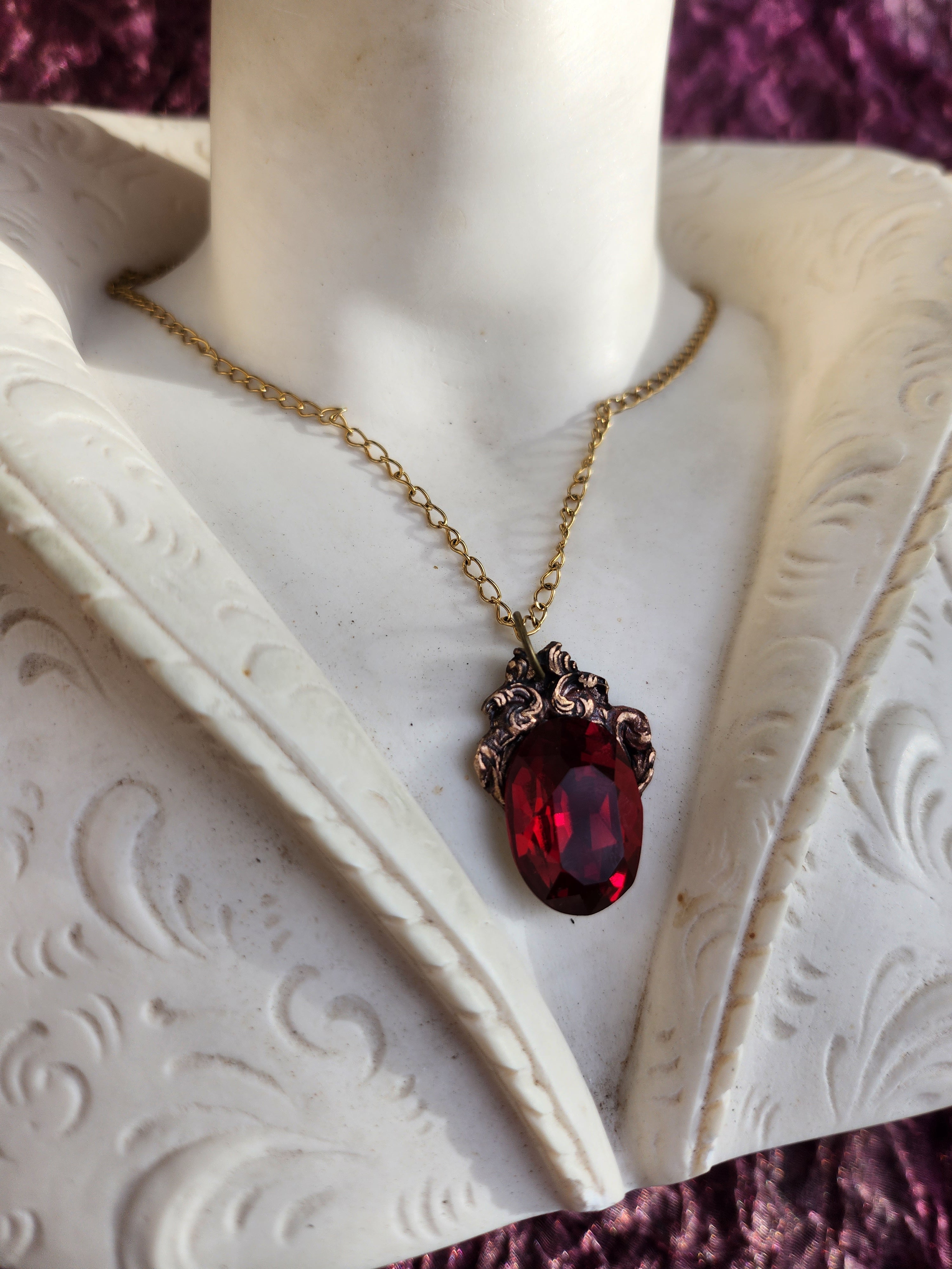 Arcane Resonance Collection – Handmade Bronze Pendant with Ruby Red Oval Crystal