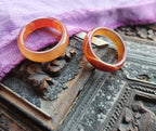 Anillo de ágata naranja con banda pulida