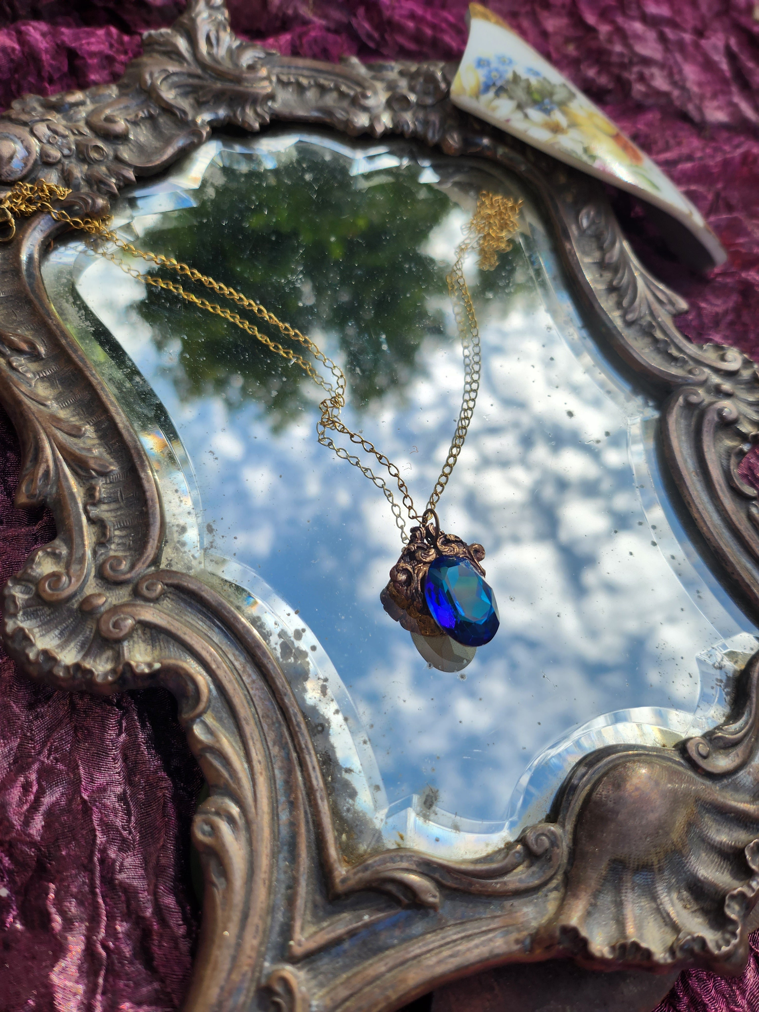 Arcane Resonance Collection – Handmade Bronze Pendant with Blue Oval Crystal