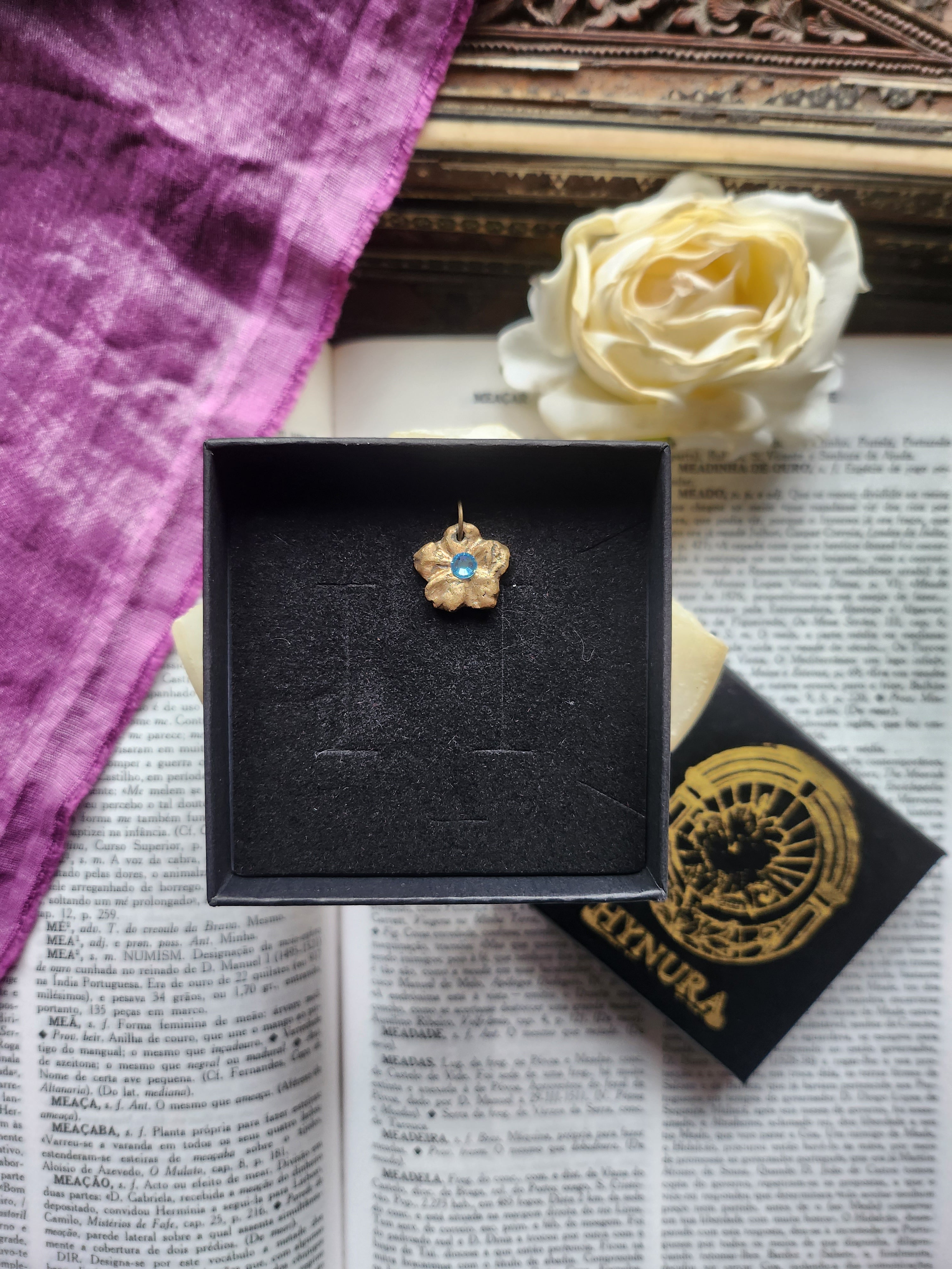 Eternal Bloom Collection – Handmade Bronze Flower Pendant with Light Blue Crystal
