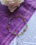 Pulsera de peridoto y cobre