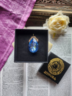 Mystic Baroque Collection – Handmade Bronze Pendant with Light Blue Teardrop Crystal